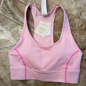 Fabletics On-The-Go Medium Impact Sports Bra. Pink.
